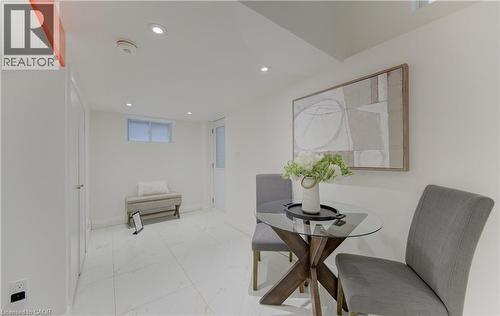 Dining area featuring recessed lighting and light marble finish flooring - 569 Stirling Avenue S, Kitchener, ON - Indoor