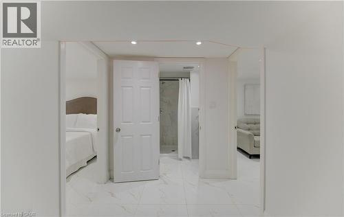 Hall featuring light marble finish flooring and recessed lighting - 569 Stirling Avenue S, Kitchener, ON - Indoor Photo Showing Other Room