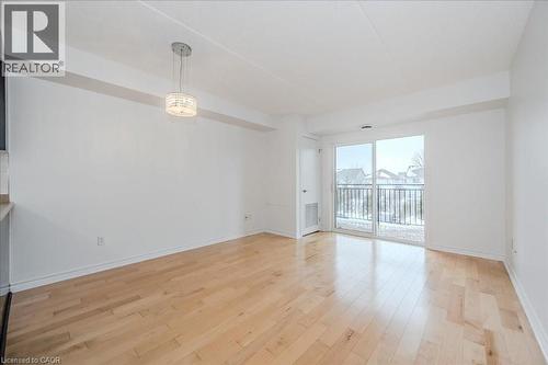 Unfurnished room featuring light wood-style flooring - 41 Goodwin Drive Unit# 202, Guelph, ON - Indoor Photo Showing Other Room