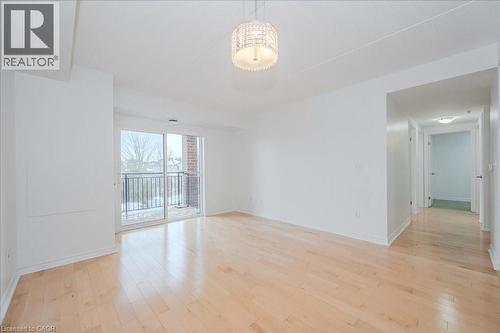 Spare room featuring light wood-style floors - 41 Goodwin Drive Unit# 202, Guelph, ON - Indoor Photo Showing Other Room