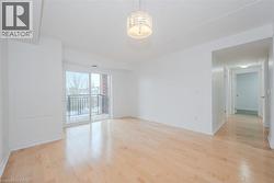 Spare room featuring light wood-style floors - 