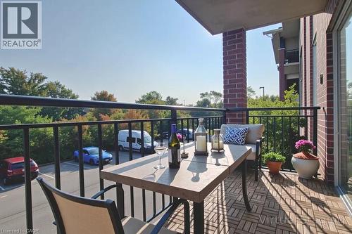 View of balcony - 41 Goodwin Drive Unit# 202, Guelph, ON - Outdoor With Balcony With Exterior