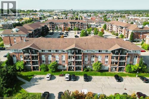 Bird's eye view of apartment complex - 41 Goodwin Drive Unit# 202, Guelph, ON - Outdoor With Balcony