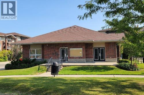 View of Amenities Building with fitness centre and party room. - 41 Goodwin Drive Unit# 202, Guelph, ON - Outdoor