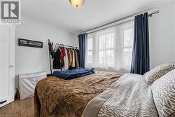 Bedroom with wood finished floors - 