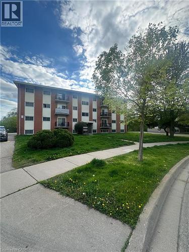 View of apartment building / complex - 145 Macgregor Crescent Unit# 1, Waterloo, ON - Outdoor With Facade