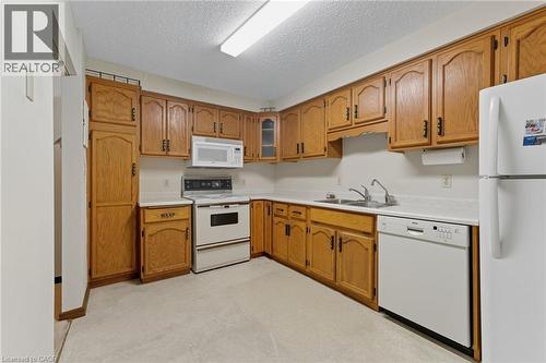400 Champlain Boulevard Unit# 305, Cambridge, ON - Indoor Photo Showing Kitchen With Double Sink