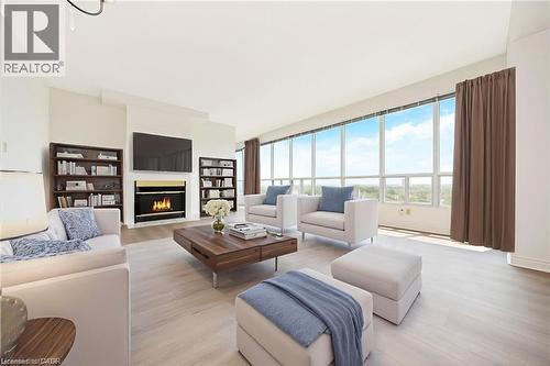 100 Millside Drive Unit# Ss01, Milton, ON - Indoor Photo Showing Living Room With Fireplace