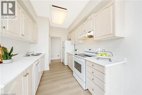 100 Millside Drive Unit# Ss01, Milton, ON - Indoor Photo Showing Kitchen With Double Sink