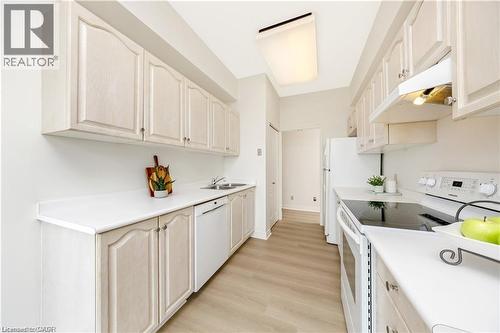 100 Millside Drive Unit# Ss01, Milton, ON - Indoor Photo Showing Kitchen With Double Sink