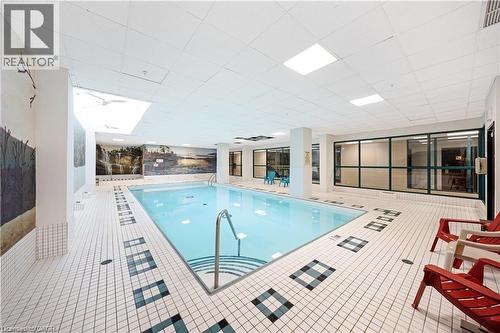 100 Millside Drive Unit# Ss01, Milton, ON - Indoor Photo Showing Other Room With In Ground Pool
