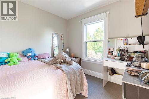 Bedroom with carpet and baseboards - 58 Chatham Street, Hamilton, ON - Indoor Photo Showing Bedroom