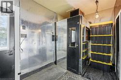 Bathroom featuring a relaxing sauna and a walk in shower - 