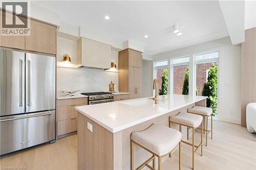 Kitchen with appliances with stainless steel finishes, modern cabinets, light brown cabinetry, and recessed lighting - 452 Westhaven Street, Waterloo, ON - Indoor Photo Showing Kitchen With Upgraded Kitchen