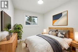 Virtually Staged; bedroom 2 with window and closet. - 