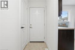 Tiled foyer makes for easy clean-up & leads into 2 p-c washrm & kitchen area. - 