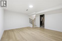 Spacious finished family room in lower level ideal for hosting game nite. - 