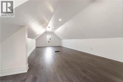 Bonus room with dark wood-style floors and lofted ceiling - 934 Barton Street E Unit# 2, Hamilton, ON - Indoor Photo Showing Other Room