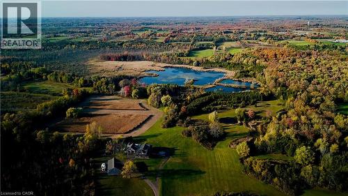 Aerial view of property's location with a nearby body of water and a forest - 1041 8Th Concession Road W, Flamborough, ON - Outdoor With View