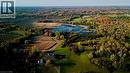Aerial view of property's location with a nearby body of water and a forest - 1041 8Th Concession Road W, Flamborough, ON  - Outdoor With View 