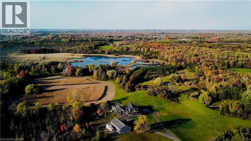 Drone / aerial view of a forest and a nearby body of water - 1041 8Th Concession Road W, Flamborough, ON - Outdoor With View