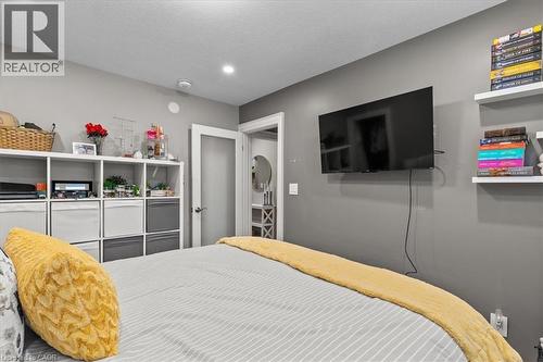 Bedroom with a textured ceiling - 50 Grove Crescent, Brantford, ON - Indoor Photo Showing Bedroom