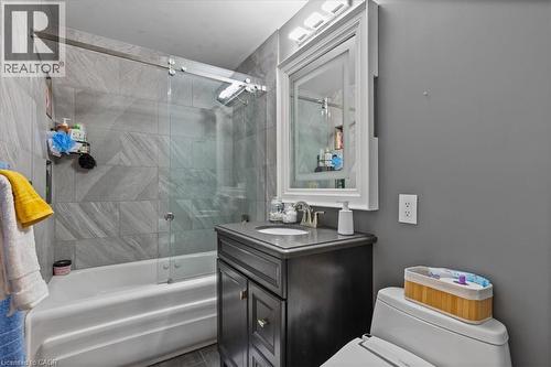 Full bathroom with enclosed tub / shower combo and vanity - 50 Grove Crescent, Brantford, ON - Indoor Photo Showing Bathroom