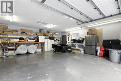 Garage with freestanding refrigerator - 