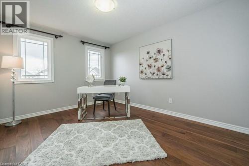 Office featuring dark wood finished floors and baseboards - 609 Woolgrass Avenue, Waterloo, ON - Indoor Photo Showing Office
