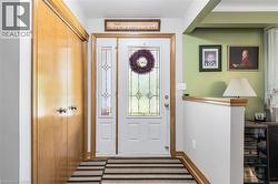 Entryway featuring baseboards - 