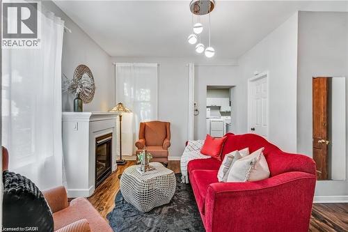 118 Queen Street S, Hamilton, ON - Indoor Photo Showing Living Room With Fireplace