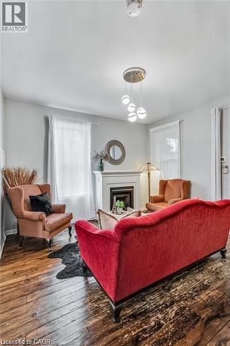 118 Queen Street S, Hamilton, ON - Indoor Photo Showing Living Room With Fireplace