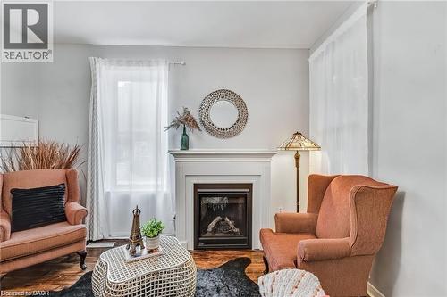 118 Queen Street S, Hamilton, ON - Indoor Photo Showing Living Room With Fireplace
