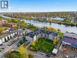 Bird's eye view of a large body of water and a notable bridge - 
