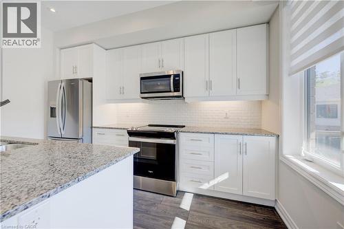 10 Birmingham Drive Unit# 116, Cambridge, ON - Indoor Photo Showing Kitchen With Stainless Steel Kitchen With Upgraded Kitchen