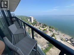 Balcony featuring a water view - 