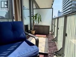 Balcony featuring a view of skyline - 