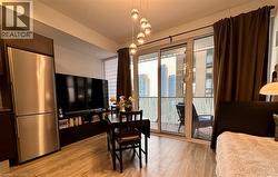 Dining area featuring light vinyl flooring - 