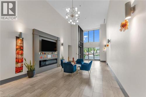 50 Herrick Avenue Unit# 231, St. Catharines, ON - Indoor Photo Showing Other Room With Fireplace