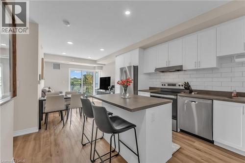 50 Herrick Avenue Unit# 231, St. Catharines, ON - Indoor Photo Showing Kitchen With Double Sink