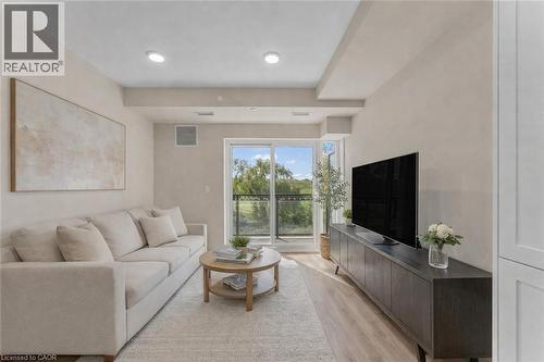 Virtually staged - 50 Herrick Avenue Unit# 231, St. Catharines, ON - Indoor Photo Showing Living Room