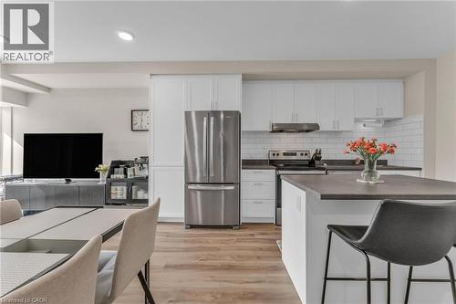 50 Herrick Avenue Unit# 231, St. Catharines, ON - Indoor Photo Showing Kitchen With Upgraded Kitchen