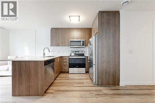 479 Charlton Avenue E Unit# 502, Hamilton, ON - Indoor Photo Showing Kitchen With Stainless Steel Kitchen