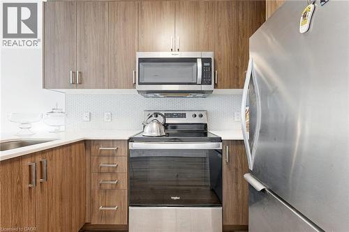 479 Charlton Avenue E Unit# 502, Hamilton, ON - Indoor Photo Showing Kitchen With Stainless Steel Kitchen