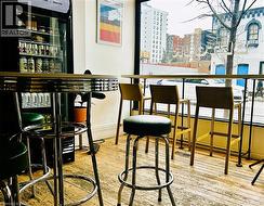 Indoor dry bar featuring a city view - 