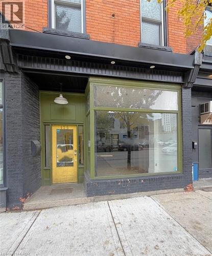 Doorway to property with brick siding - 175 John Street S, Hamilton, ON 