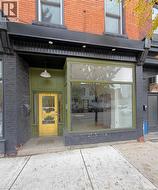 Doorway to property with brick siding - 