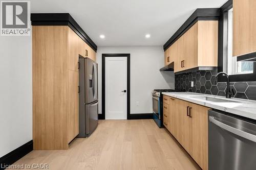 105 Rothsay Avenue, Hamilton, ON - Indoor Photo Showing Kitchen With Double Sink