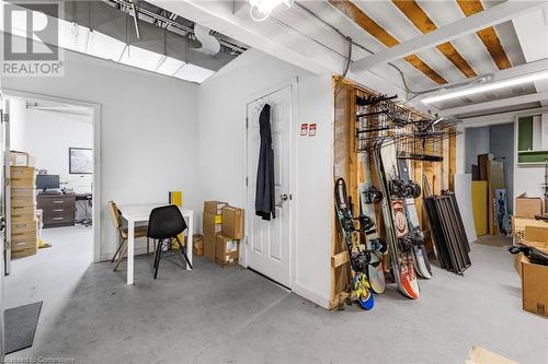 Below grade area with a desk - 622 Upper James Street, Hamilton, ON 