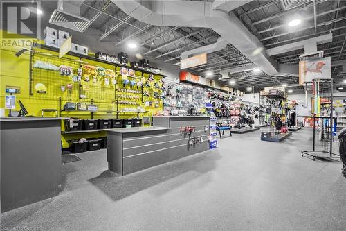 Misc room featuring a workshop area and rubber floors - 622 Upper James Street, Hamilton, ON 